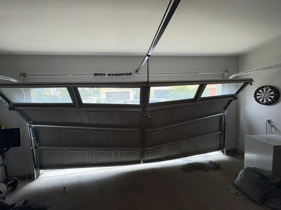 Damaged garage door panel repair, Let's Roll Garage Doors Austin TX